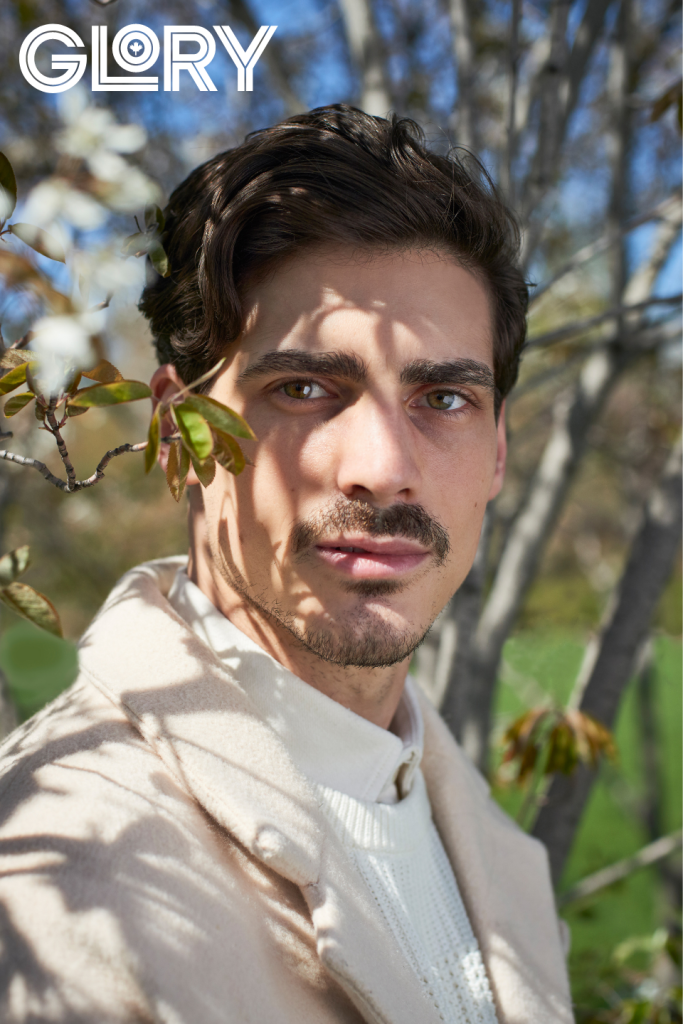 Paul Poirier in white under tree